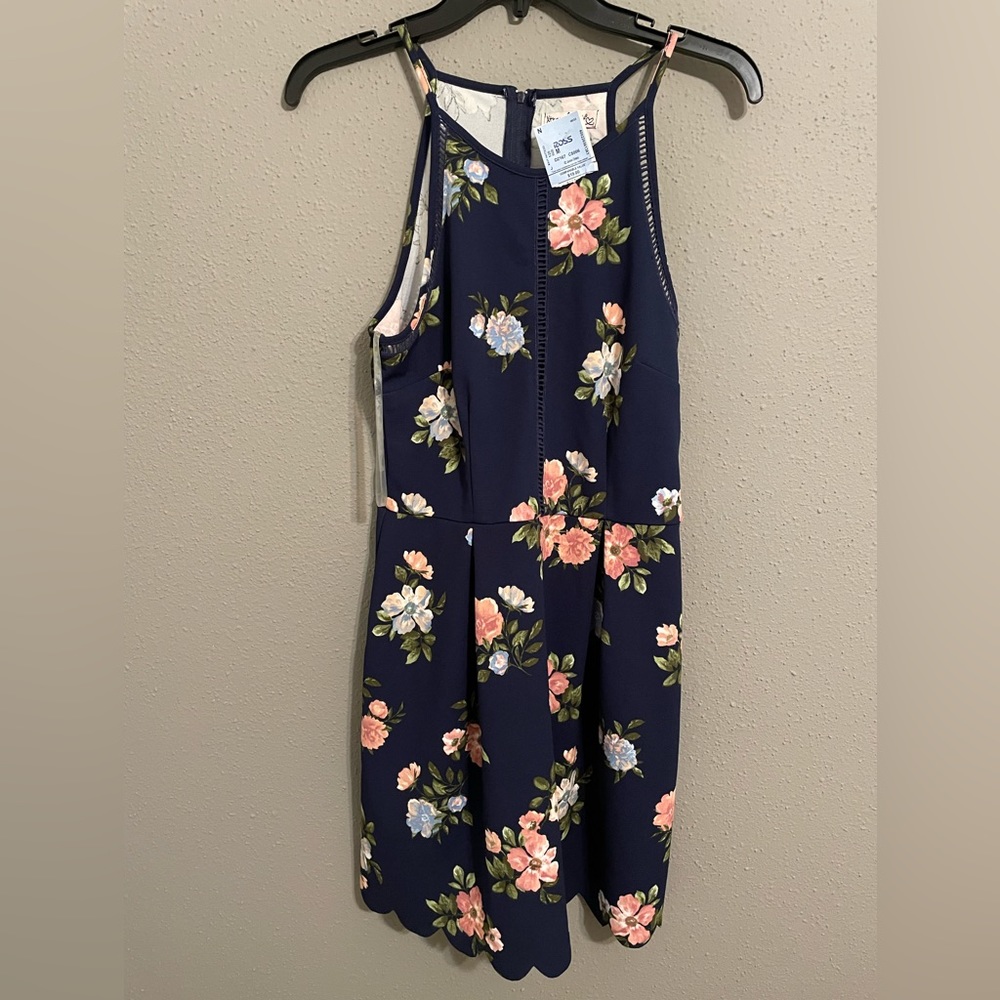 Floral Dress. Size Medium. Zip up (zipper on back) New with tags.